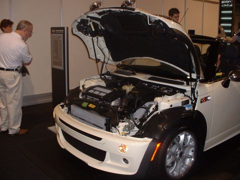 1999 Ford Crown Victoria - 2006 Mini Cooper with "hood" open