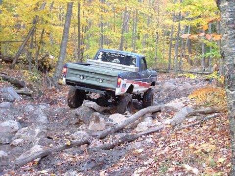 1977 Ford F-150 - This 1977 Ford F-150 navigates a challenging off-road course during autumn.