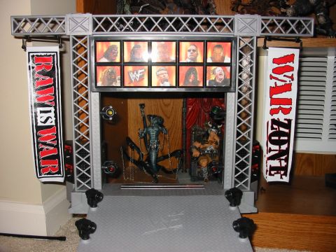 1991 Ford Bronco - A WWF wrestling ring entrance stage is set up with banners and action figures, not a 1991 Ford Bronco.