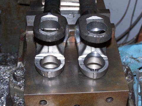1979 Ford Bronco - Close-up view of two u-joints, possibly for a vehicle drivetrain, with a Supermotors.net watermark visible.