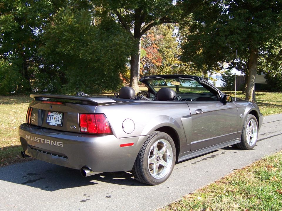 Gray 2004 Ford Mustang convertible rear view with GT badging