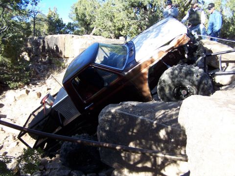 1981 Ford Bronco - This off-road vehicle, likely a 1978 Ford Bronco, is navigating a rocky terrain.