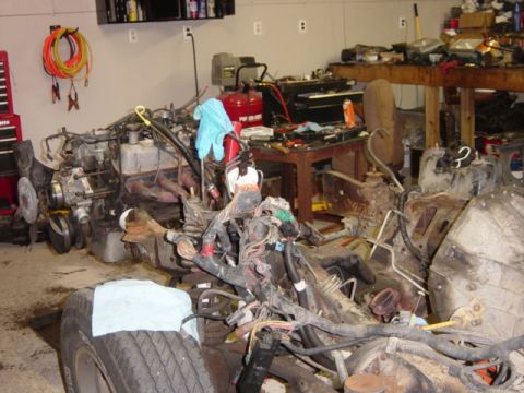 1991 Ford Bronco - No more front bumper, 302 on a stand. It's disgusting how quickly you can pull an engine when there's no bodywork in the way.