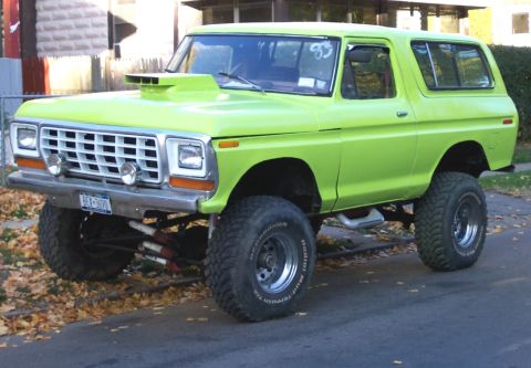 1978 Ford Bronco - This lifted 1978 Ford Bronco features a prominent hood scoop and aggressive off-road tires.