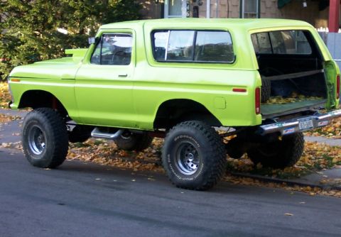 1978 Ford Bronco - This lifted 1978 Ford Bronco features a bright lime green paint job and large off-road tires.