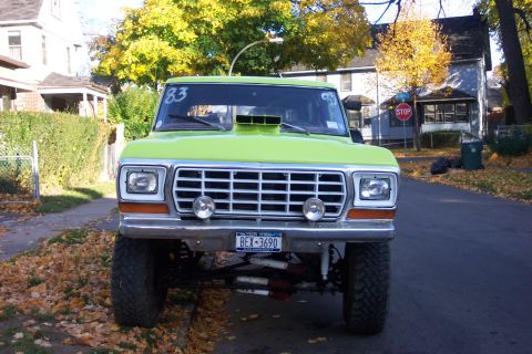 1978 Ford Bronco - This modified 1978 Ford Bronco features a bright lime green paint job and a prominent hood scoop.