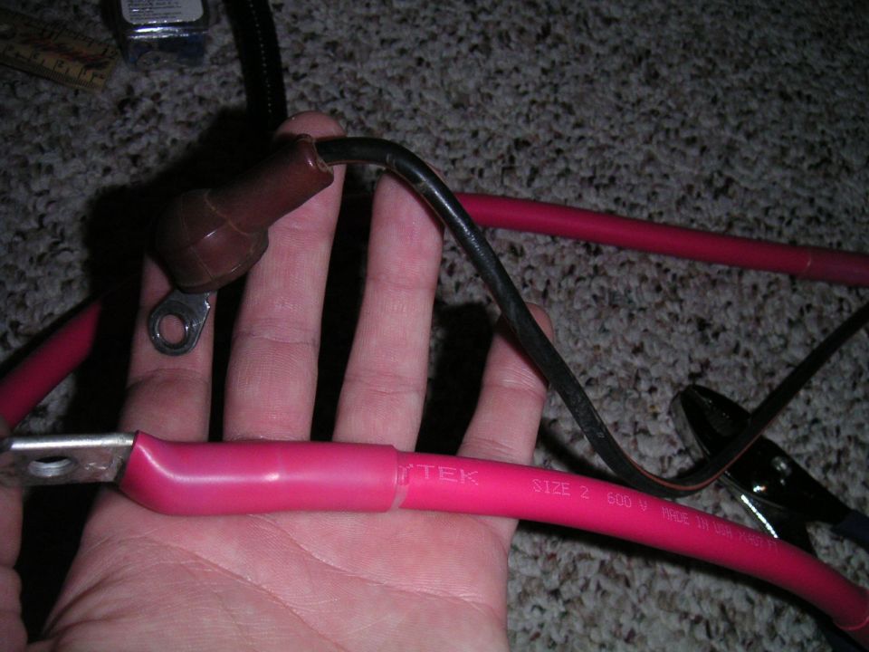 New charge cable next to stock one.  Big difference.