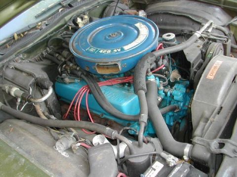 1973 Ford Ranchero - Engine bay view shows a V8 engine with a blue block and air cleaner assembly.
