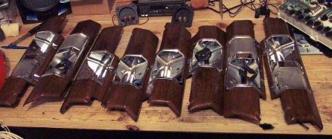 1985 Ford LTD Crown Victoria - These are interior trim pieces with wood grain and chrome accents, likely for a car.