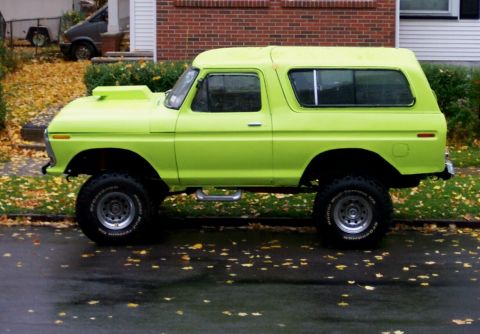 1978 Ford Bronco - This lifted 1978 Ford Bronco features a prominent hood scoop and a vibrant lime green paint job.