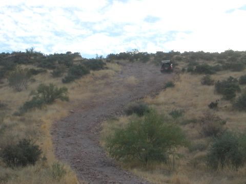 1984 Ford Bronco - My Buddy Shane trying out a really steep hill. picked up the front end shifting, lol.