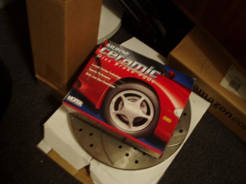 1993 Ford Taurus - Box for Morse Ceramic Disc Brake Pads, a graphic of a red car and wheel.