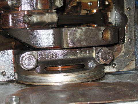 1976 Ford F-150 - here is the rear main bearing cap before I removed it to replace the rear main seal that was leaking.