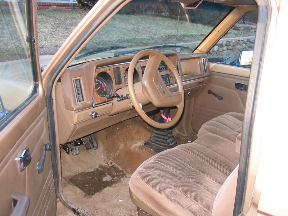 1988 Ford Ranger interior with tan seats and dashboard