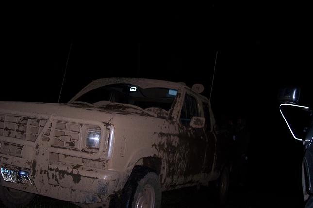 Mud-covered 1988 Ford Ranger front grille and headlight