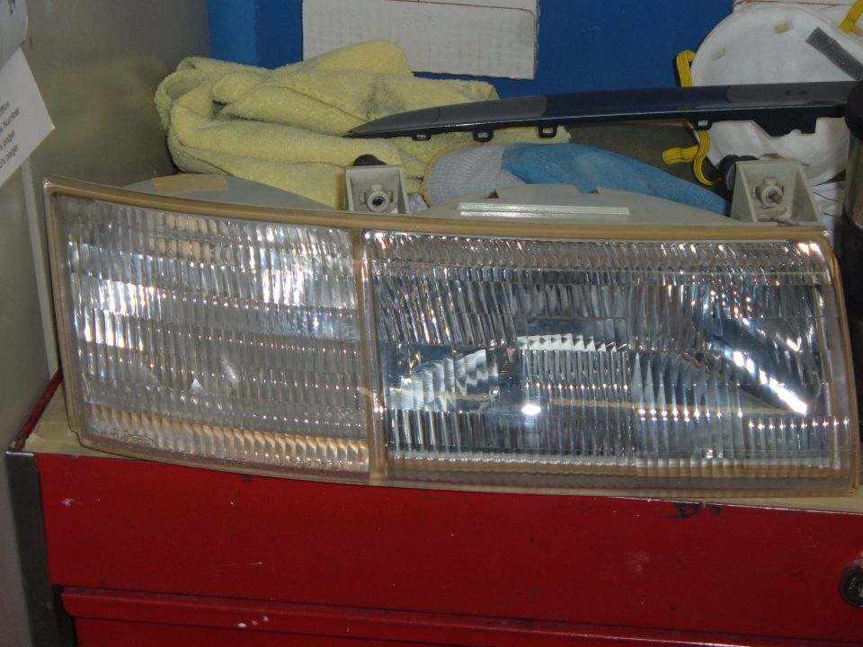 Right head light, after a new coat of clear. And some sanding of course. 10-11-05