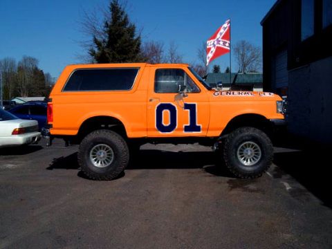 1989 Ford Bronco - This lifted orange Bronco is painted to resemble the General Lee from The Dukes of Hazzard.