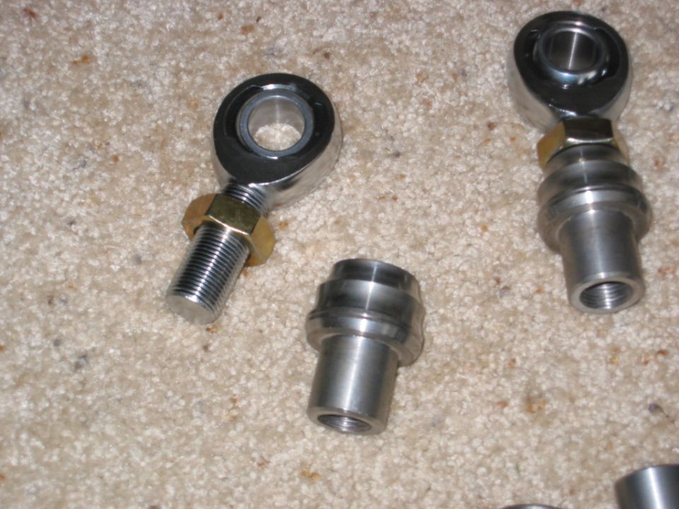 New heim joint rod ends with jam nuts and weld-in tube bungs on carpet