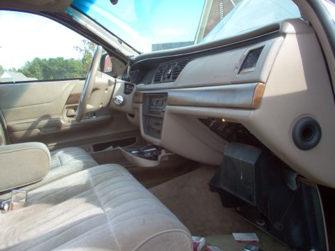 1994 Ford Crown Victoria - First, remove the 2 nuts below the ventilation box at the front edge of the carpet of the passenger footwell. There are several connectors…
