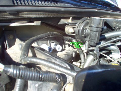 1994 Ford Crown Victoria - I had already disconnected 1 hose when the core leaked all my coolant into the ventilation system, so I only had 1 hose, this 1 nut, & 3 co…