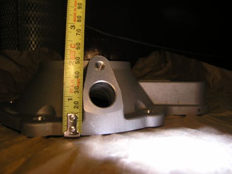 2001 Jeep Wrangler - Close-up of an automotive part with a tape measure for scale.