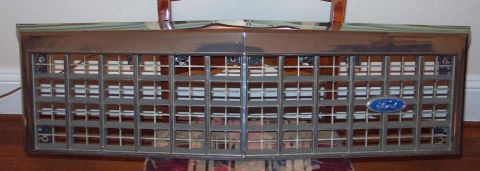 1985 Ford LTD Crown Victoria - Grille assembly with Ford emblem, possibly from a 1985 Crown Victoria LTD.