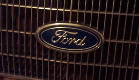 1985 Ford LTD Crown Victoria - Ford emblem on a vehicle grille.