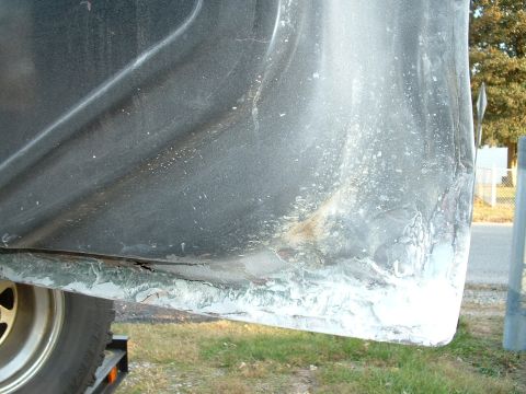 1978 Ford Bronco - This image shows the lower section of a vehicle's body, highlighting areas of rust and recent bodywork.