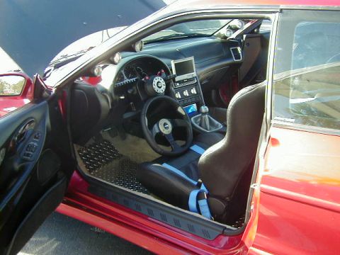 1994 Ford Probe - Interior view of a 1994 Ford Probe, showing custom modifications and racing seats.