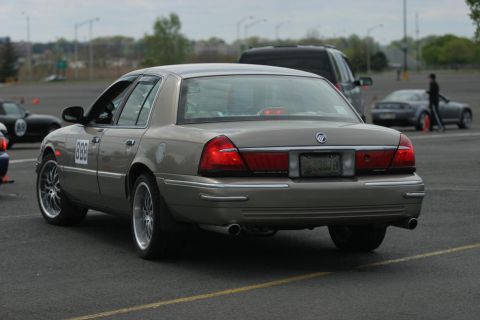2001 Mercury Grand Marquis - A 2001 Mercury Grand Marquis, identified by its body style and rear badging, participates in an autocross event.
