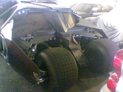 1988 Ford Bronco - This image shows the rear wheels and exposed mechanical components of a heavily modified vehicle.