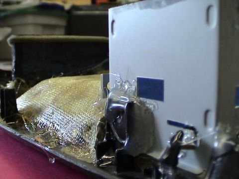 1997 Ford Probe - Close-up of a custom center console modification, showing fiberglass and hot glue construction.