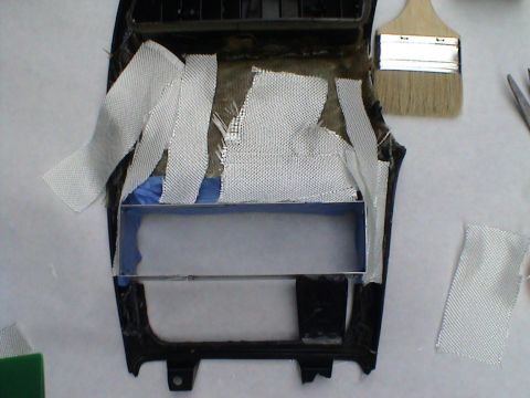 1997 Ford Probe - Modifying a car's center console trim with fiberglass reinforcement.