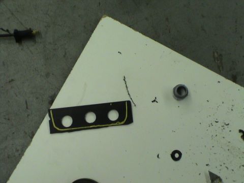 1997 Ford Probe - A custom center console part with three holes is shown on a white surface, with a SuperMotors logo visible at the bottom.