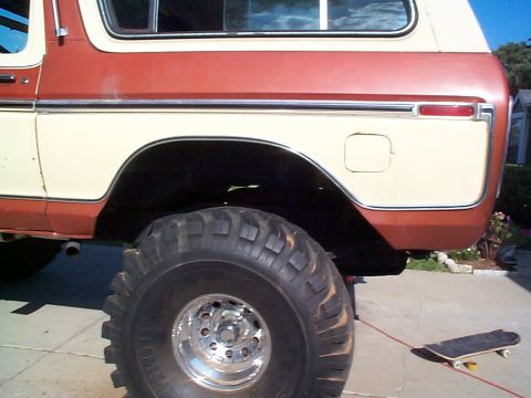 1979 Ford Bronco - This 1978 Ford Bronco features a two-tone paint scheme and is equipped with large off-road tires.