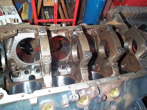 1979 Ford Bronco - This image shows the internal components of an engine block, specifically the crankshaft and connecting rods.