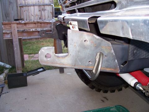 1979 Ford Bronco - Close-up of a custom front bumper bracket and tow hook, possibly for a 1979 Ford Bronco.