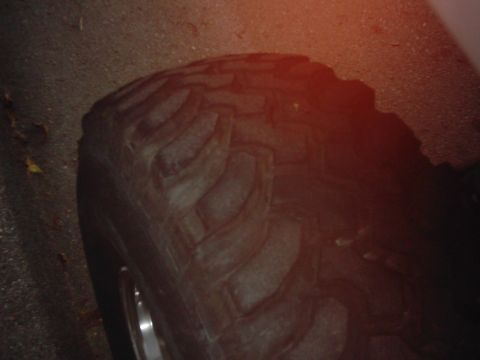1978 Ford Bronco - A close-up view of a tire tread, suggesting off-road capability.