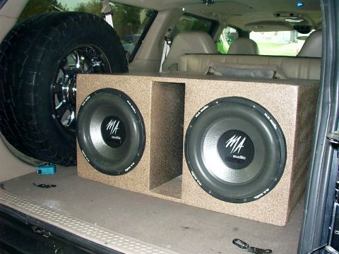 2000 Ford Excursion - Dual MA Audio subwoofers and spare tire are visible in the cargo area of a 2000 Ford Excursion.