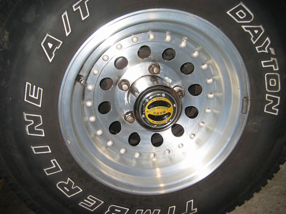 Wheel with WARN locking hub and Dayton A/T tires