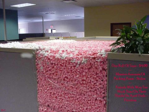 2001 Ford Crown Victoria - An office cubicle is overflowing with packing peanuts, obscuring the view of the interior.