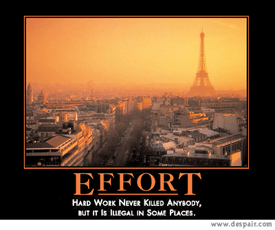 2001 Ford Crown Victoria - A motivational poster a Paris cityscape and the Eiffel Tower with text about effort.