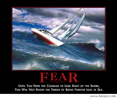 2001 Ford Crown Victoria - A sailboat struggles against a massive wave, illustrating the power and danger of the sea.