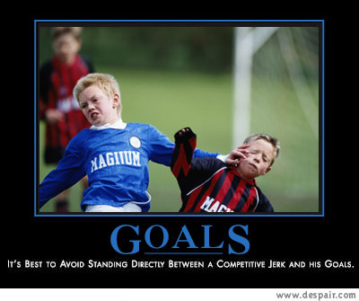 2001 Ford Crown Victoria - A motivational poster with the title "GOALS" and a caption about avoiding competitive jerks.