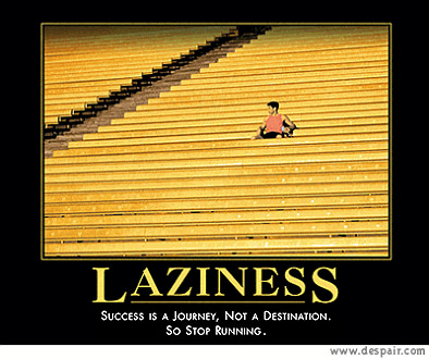 2001 Ford Crown Victoria - A motivational poster with the word LAZINESS and a quote about success.