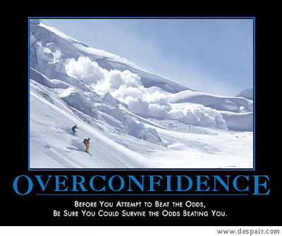 2001 Ford Crown Victoria - A motivational poster depicts skiers narrowly escaping an avalanche, illustrating the dangers of overconfidence.