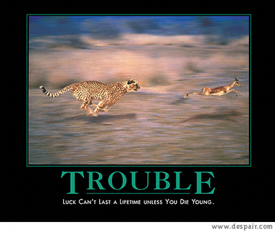 2001 Ford Crown Victoria - A cheetah in pursuit of a gazelle across a blurred, arid terrain, with motivational text overlaid.