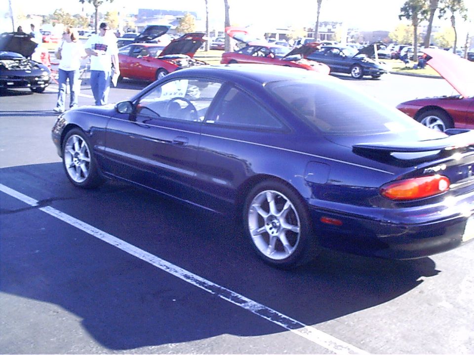 1995 Ford Probe parked in a lot with other cars