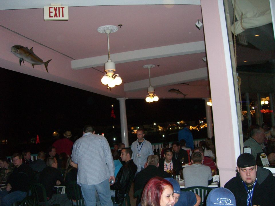 Interior of a restaurant with an EXIT sign and fish decorations