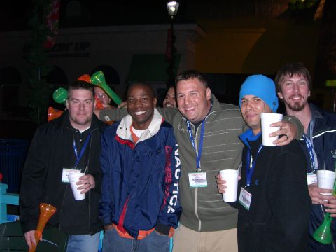 1996 Ford Probe - A group of friends enjoy a night out, holding drinks and party favors.